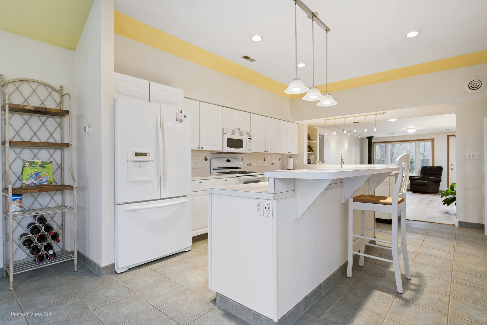 2580 Van Dyke Road Minooka, IL 60447 - Photo 6 of 32 a kitchen with kitchen island a white counter top space cabinets and stainless steel appliances
