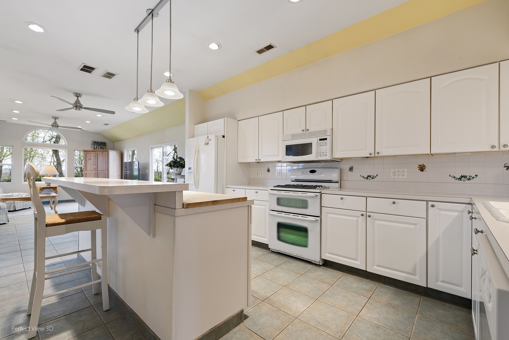 2580 Van Dyke Road Minooka, IL 60447 - Photo 8 of 32 a kitchen with white cabinets and white appliances