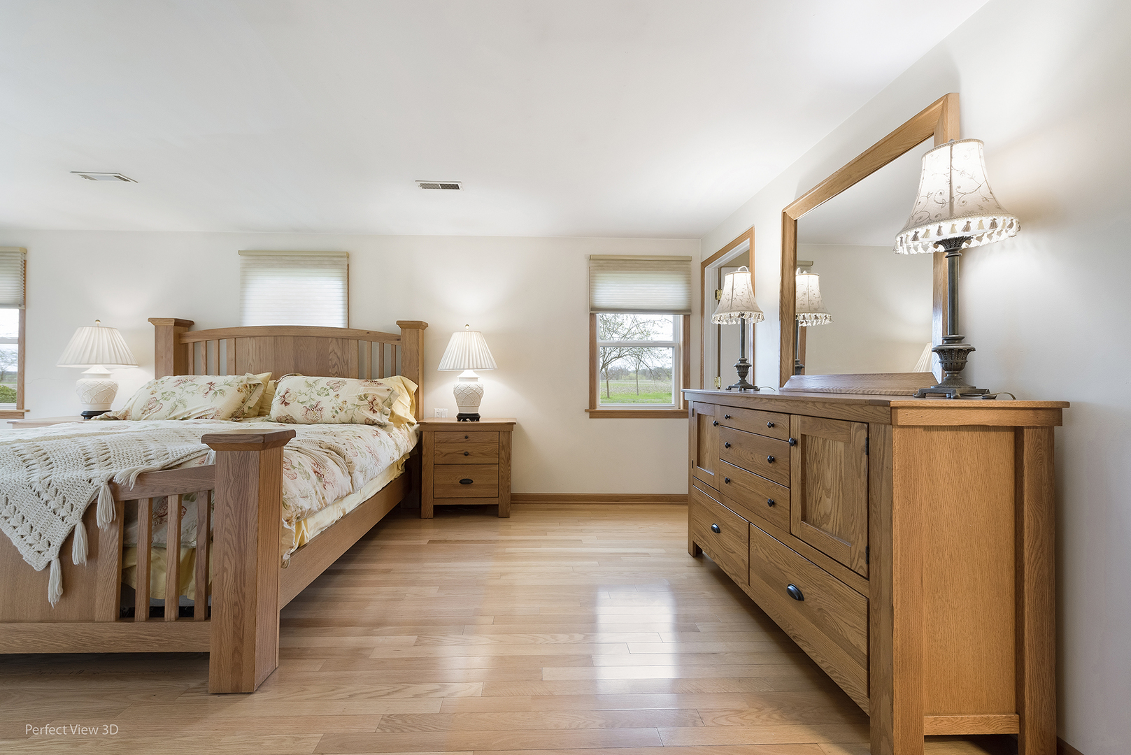 2580 Van Dyke Road Minooka, IL 60447 - Photo 10 of 32 a bed room with a bed and a dresser