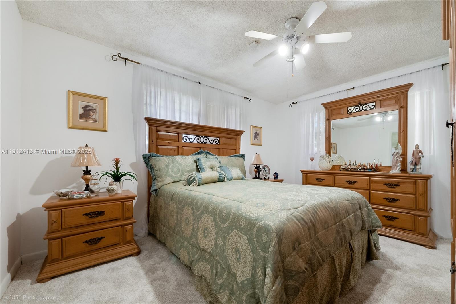 4235 Southwest 97th Avenue Miami, FL 33165 - Photo 11 of 21 a bedroom with a bed and a dresser