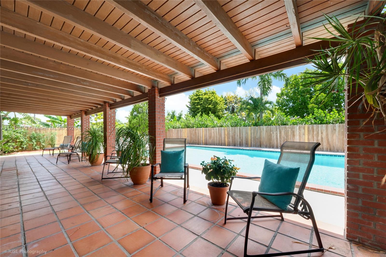 4235 Southwest 97th Avenue Miami, FL 33165 - Photo 3 of 21 a garden view with a seating space