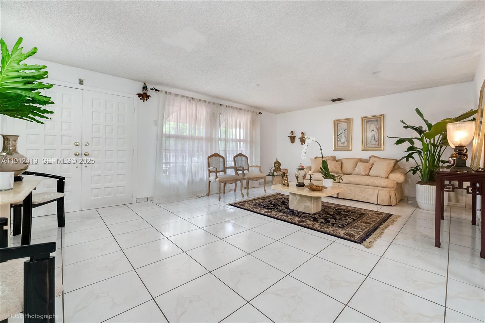 4235 Southwest 97th Avenue Miami, FL 33165 - Photo 5 of 21 a living room with furniture