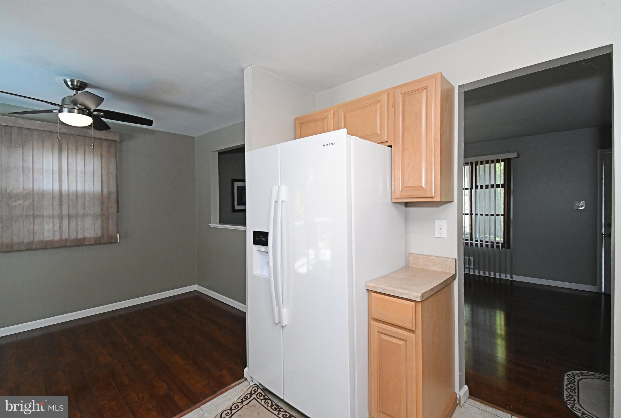 609 Mansfield Road Willow Grove, PA 19090 - Photo 16 of 68 a white refrigerator freezer and a stove sitting inside of a kitchen