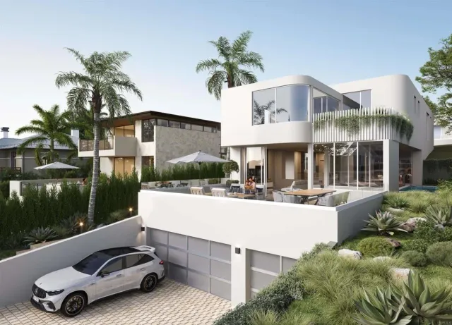 a view of a patio with table and chairs potted plants