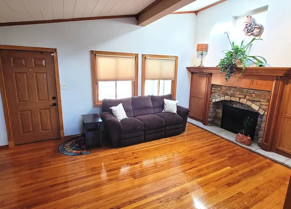 a room with furniture and flat screen tv