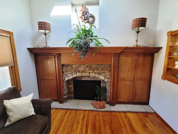 a room with furniture and a flat screen tv