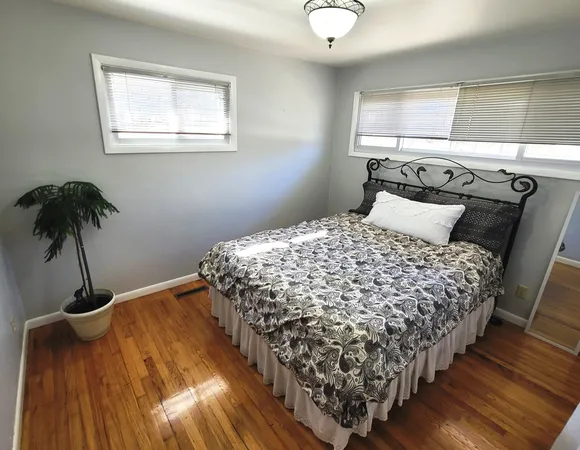 a view of a house with a snow in the yard