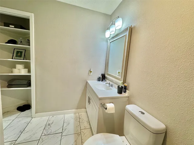 a view of balcony with a potted plant