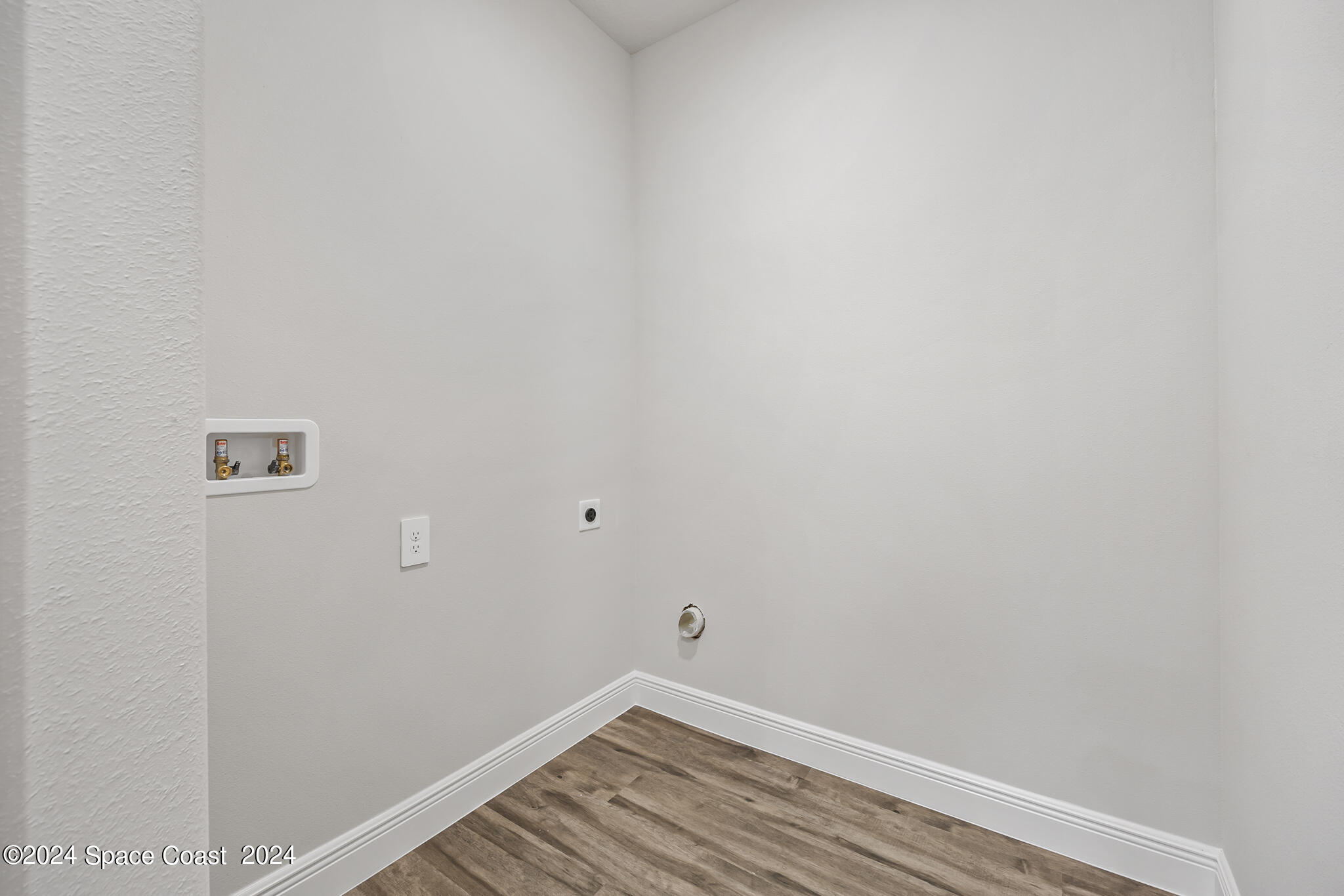 1368 Rabbit Street Southeast Palm Bay, FL 32909 - Photo 24 of 31 a view of a room with wooden floor