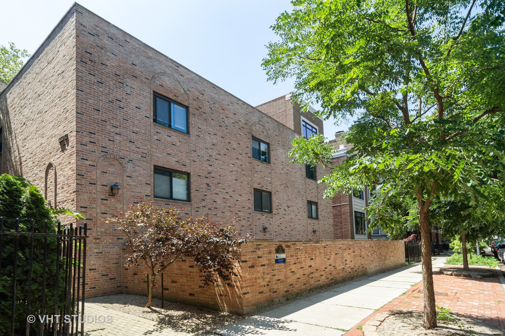 711 West Melrose Street, Unit B2 Chicago, IL 60657 - Photo 1 of 22 a front view of a house with trees