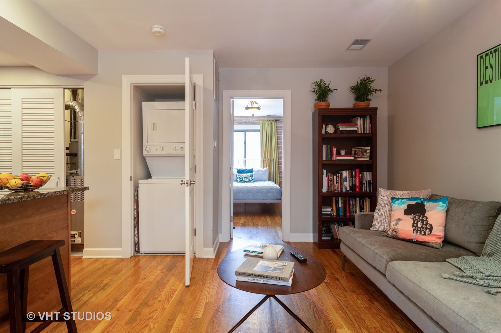 711 West Melrose Street, Unit B2 Chicago, IL 60657 - Photo 18 of 22 a living room with furniture a rug and a window