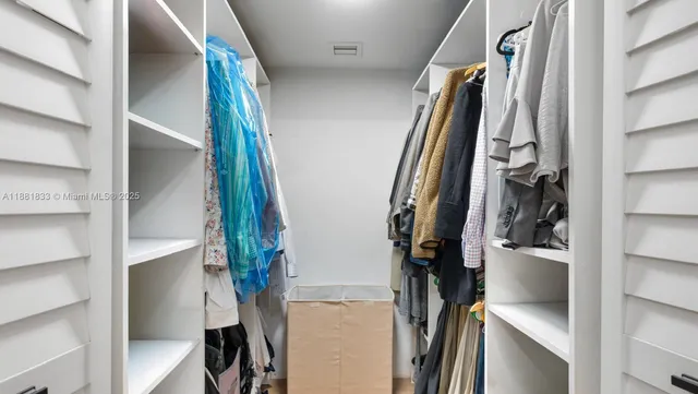 a view of house with yard and green space