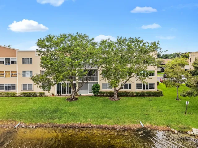 a view of a city with lawn chairs