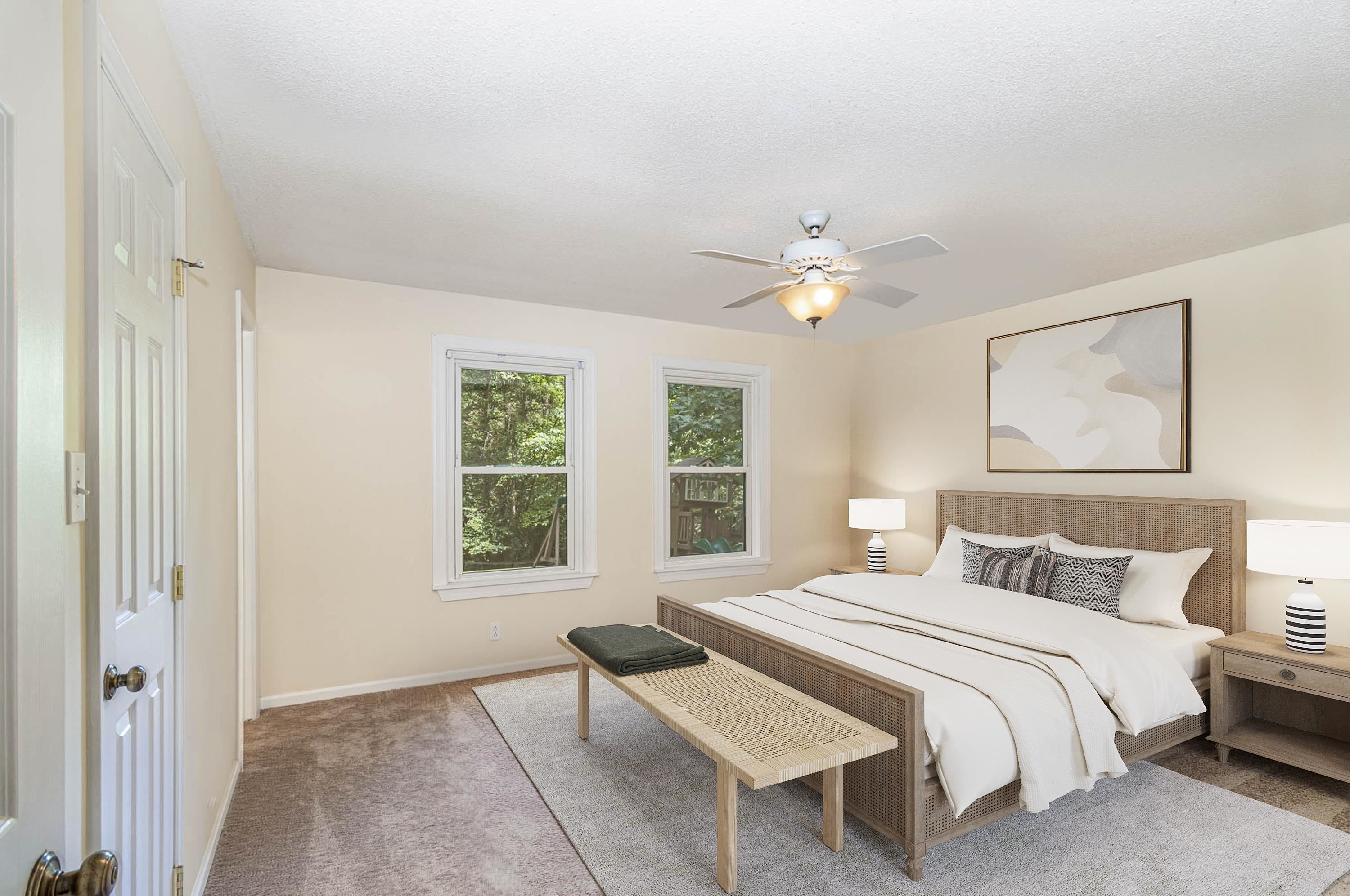 1520 John Jones Road Bahama, NC 27503 - Photo 10 of 20 a bedroom with a bed and a painting on the wall
