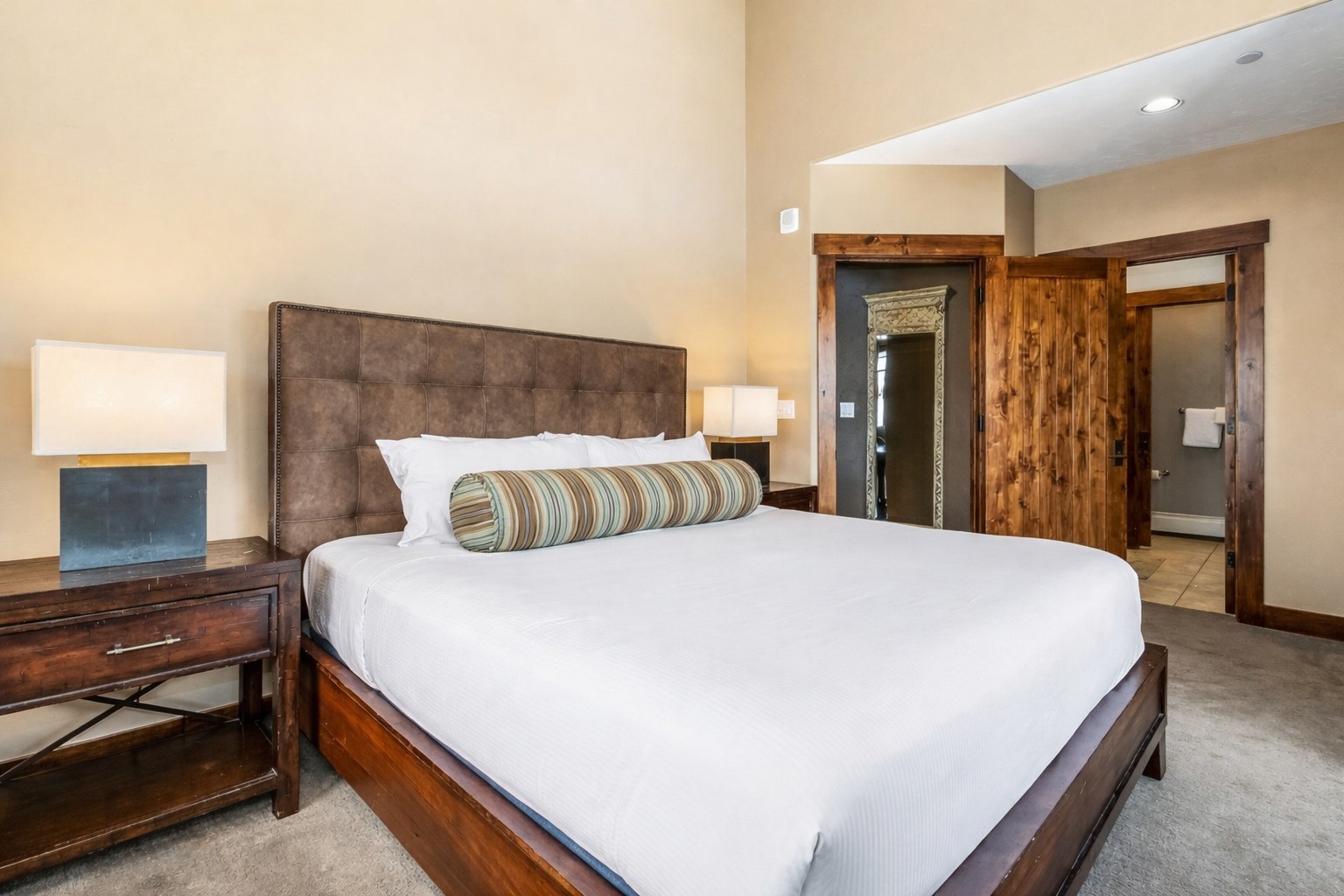 600 Columbine Road, Unit 5305 Breckenridge, CO 80424 - Photo 11 of 36 a bedroom with a bed and a tv