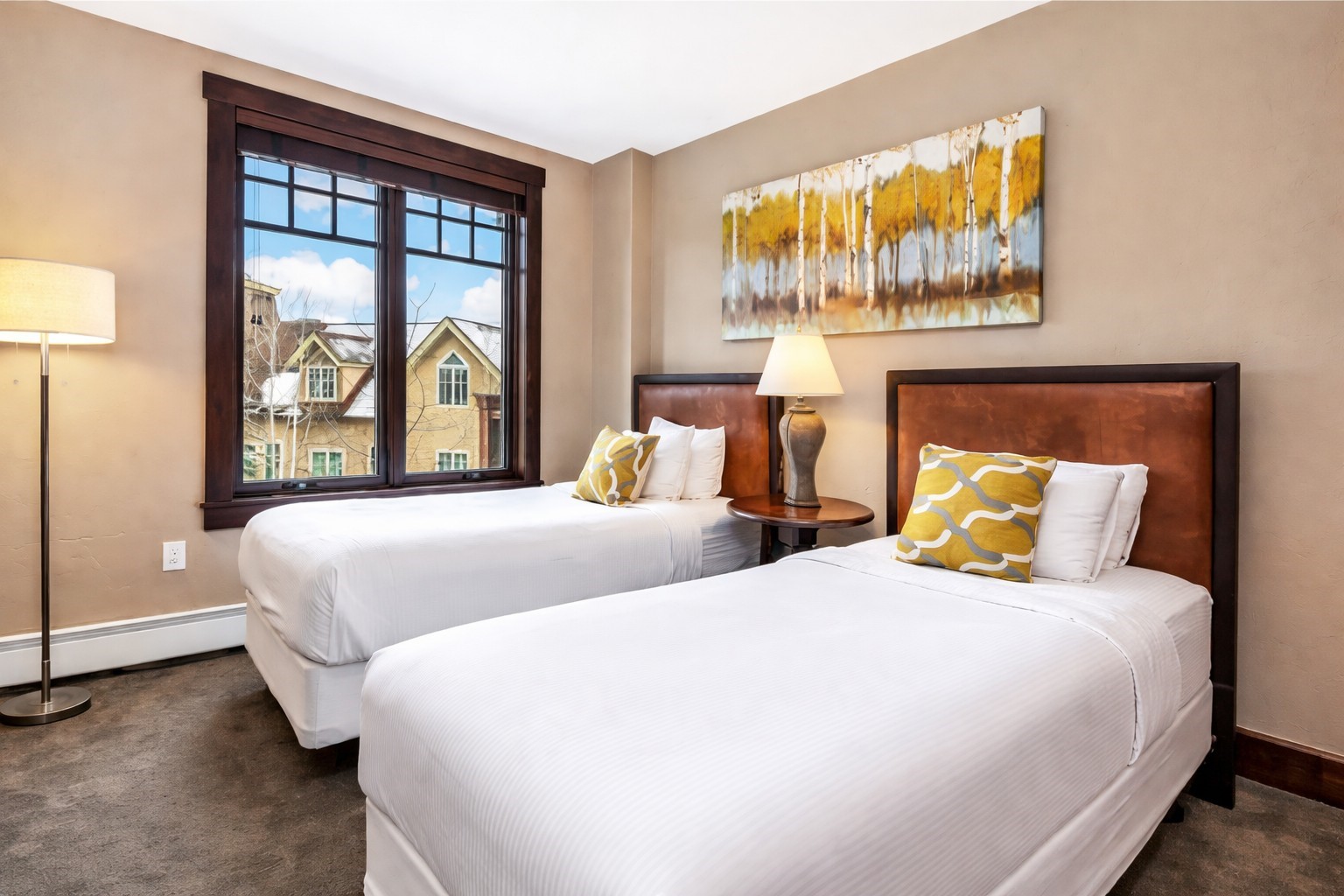 600 Columbine Road, Unit 5305 Breckenridge, CO 80424 - Photo 14 of 36 a bedroom with two beds and a large window