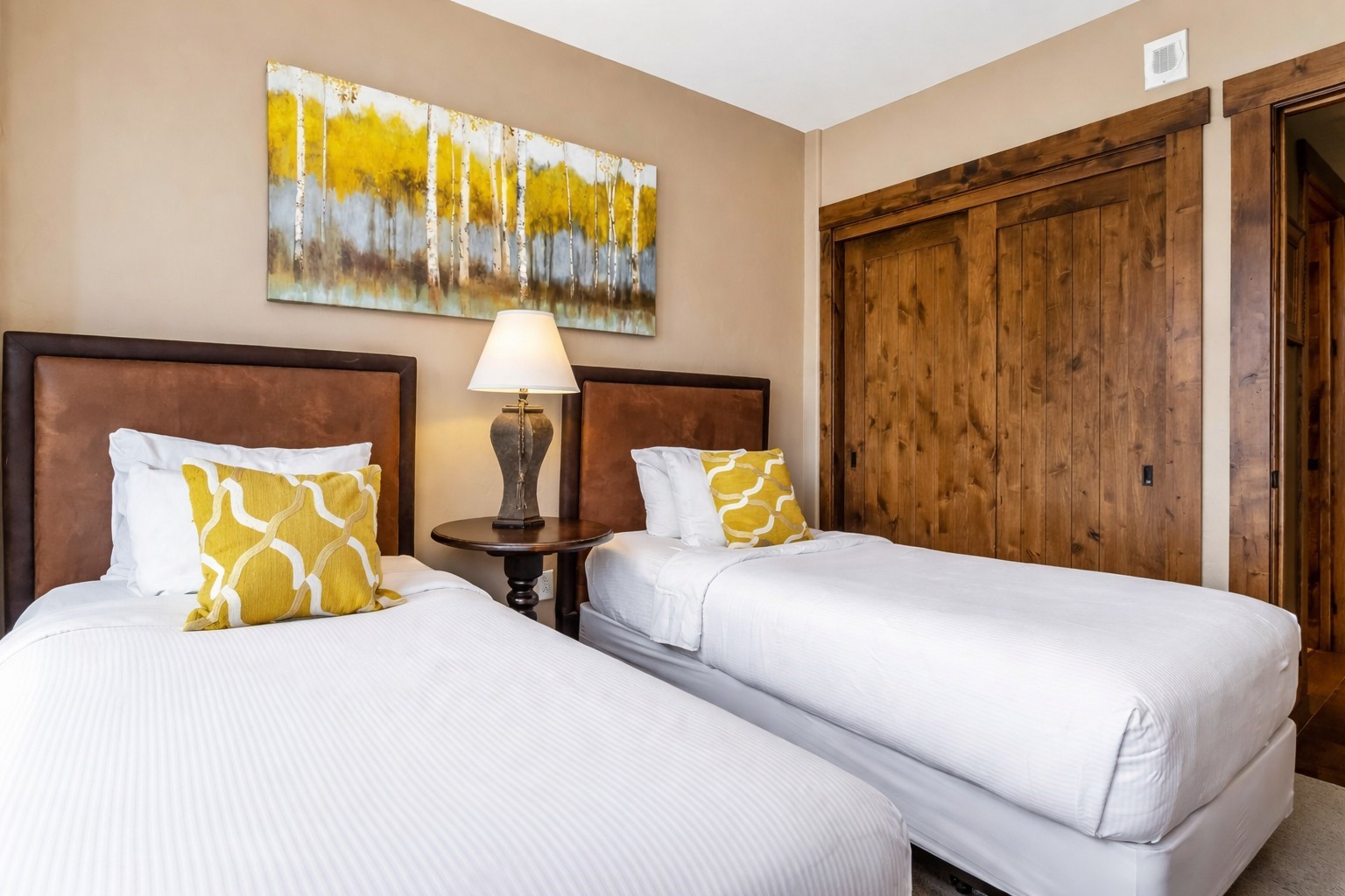 600 Columbine Road, Unit 5305 Breckenridge, CO 80424 - Photo 15 of 36 a bedroom with two beds and painting on the wall