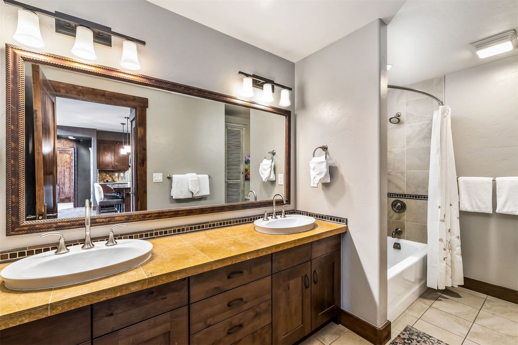 600 Columbine Road, Unit 5305 Breckenridge, CO 80424 - Photo 16 of 36 a spacious bathroom with a double vanity sink mirror and double