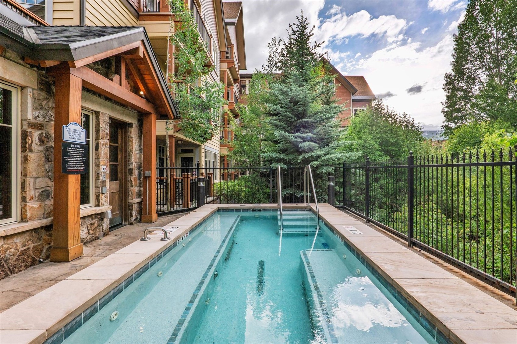 600 Columbine Road, Unit 5305 Breckenridge, CO 80424 - Photo 20 of 36 a view of balcony with a swimming pool