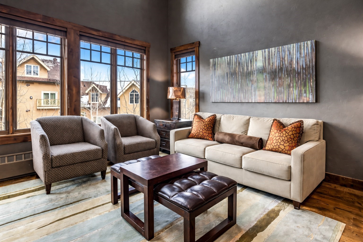 600 Columbine Road, Unit 5305 Breckenridge, CO 80424 - Photo 2 of 36 a living room with furniture and a large window