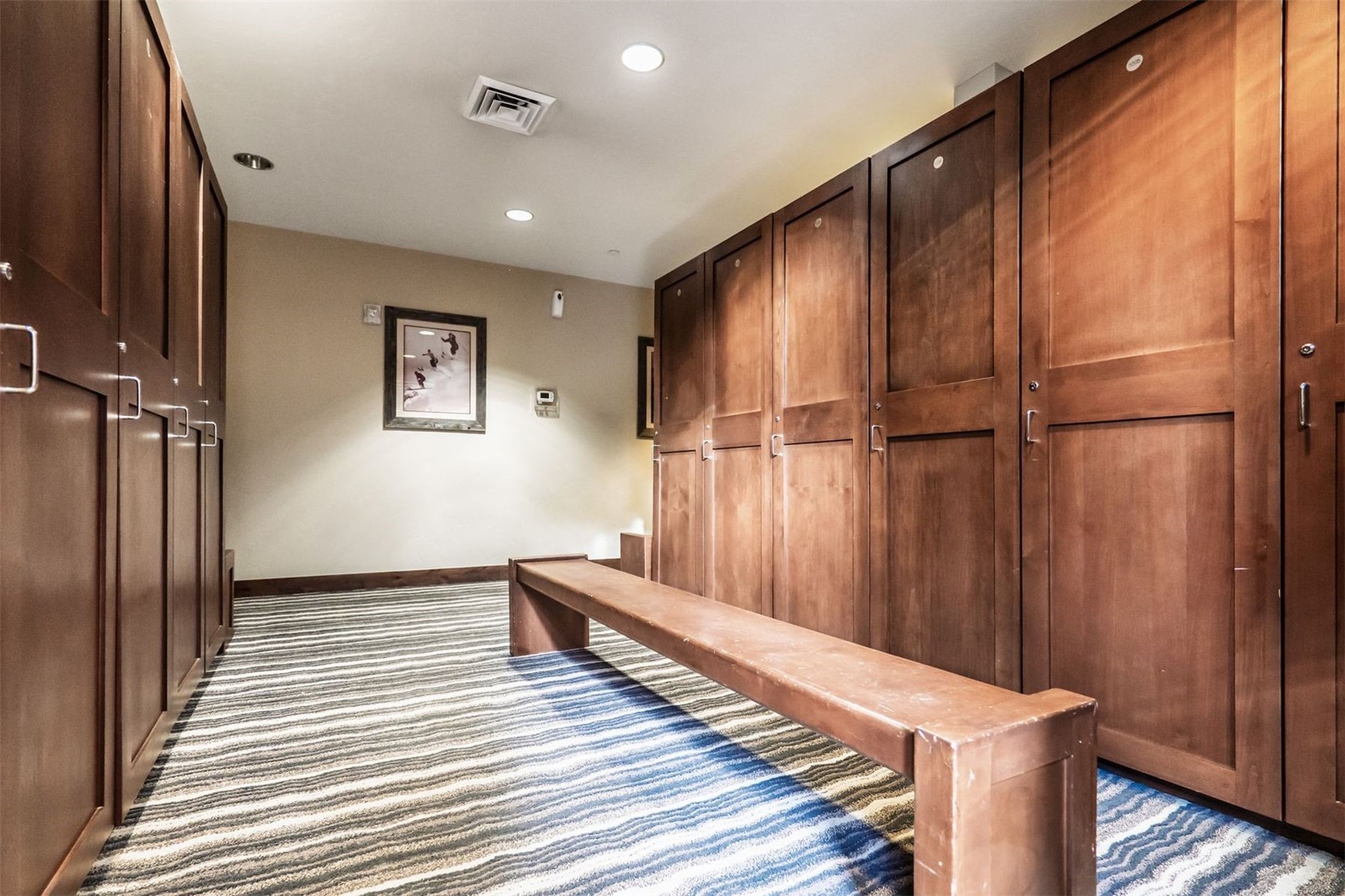 600 Columbine Road, Unit 5305 Breckenridge, CO 80424 - Photo 24 of 36 a view of a hallway with wooden floor
