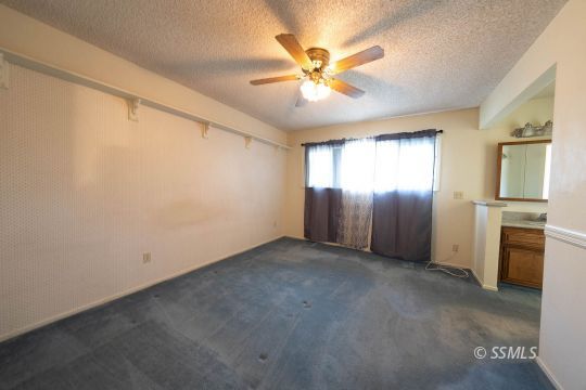 736 Sherri Street Ridgecrest, CA 93555 - Photo 15 of 42 a view of an empty room with a window