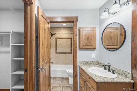 a view of storage and utility room with washer and dryer