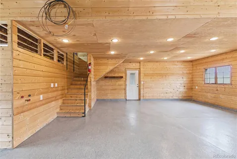 a bathroom with a toilet and shower