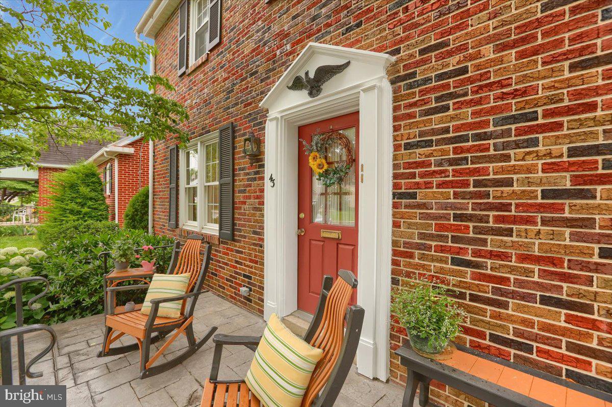43 East Lemon Street Lititz, PA 17543 - Photo 1 of 27 a view of a chair and tables in the patio with potted plants