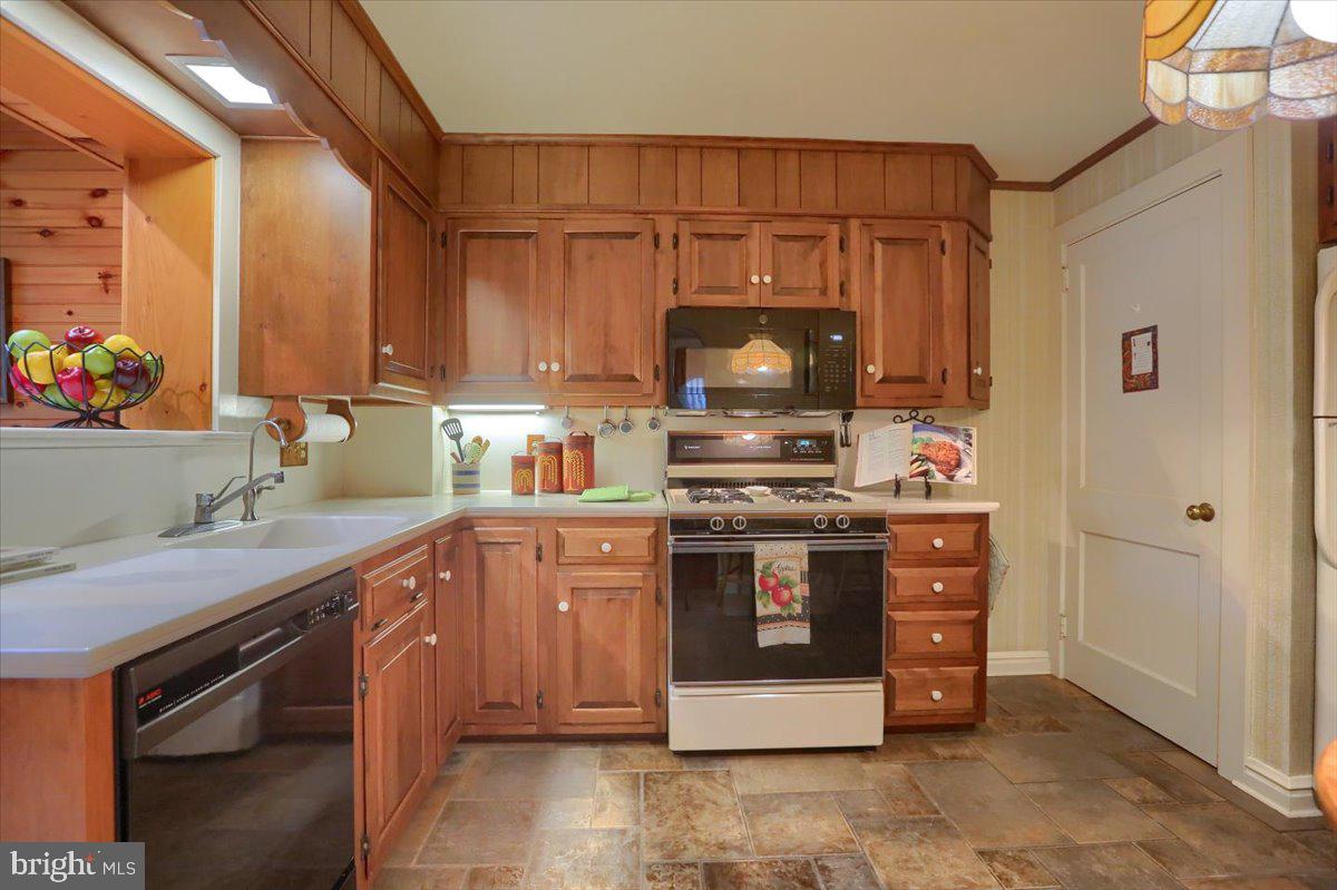43 East Lemon Street Lititz, PA 17543 - Photo 14 of 27 a kitchen with stainless steel appliances a stove a sink and a microwave