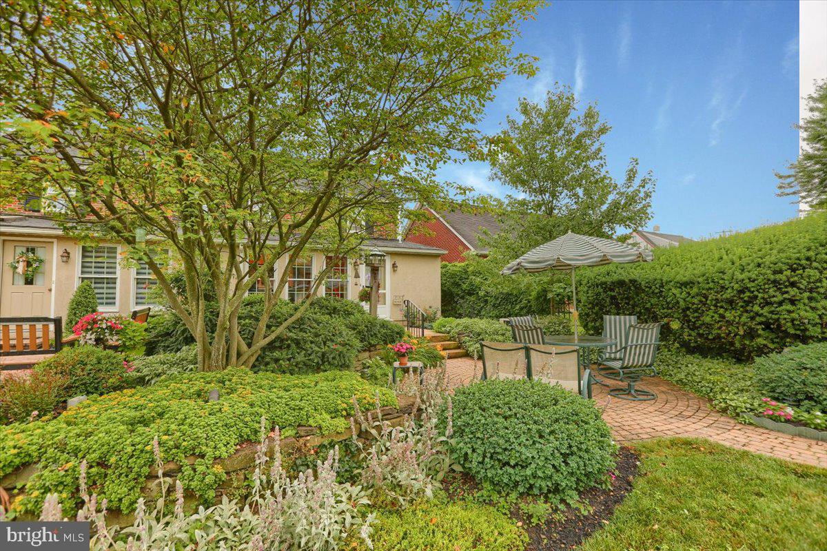 43 East Lemon Street Lititz, PA 17543 - Photo 5 of 27 a view of a house with patio a garden