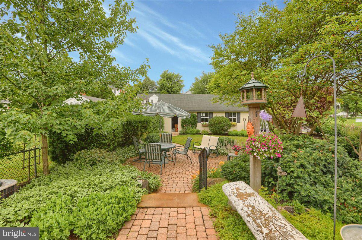43 East Lemon Street Lititz, PA 17543 - Photo 7 of 27 a view of a patio with table and chairs and potted plants