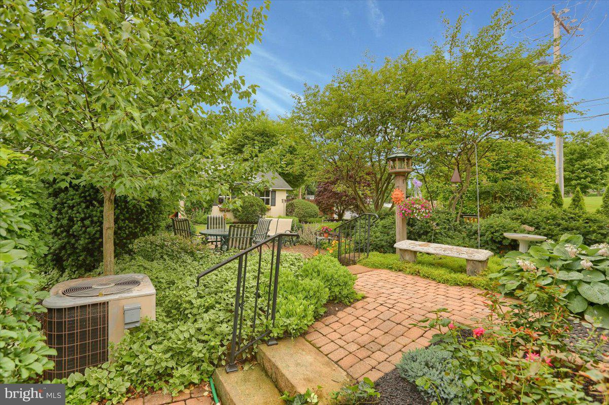 43 East Lemon Street Lititz, PA 17543 - Photo 8 of 27 a view of a garden with plants and large trees