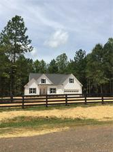 2085 Cedar Road York, SC 29745 - Photo 2 of 13 a front view of a house with a boat