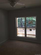 2085 Cedar Road York, SC 29745 - Photo 3 of 13 a view of an empty room with a window