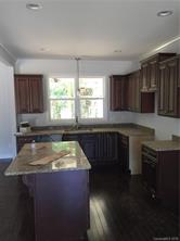 2085 Cedar Road York, SC 29745 - Photo 8 of 13 a kitchen with a sink a window and cabinets