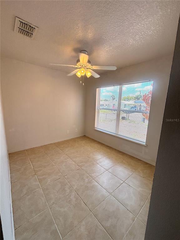 531 Carlisle Avenue Altamonte Springs, FL 32714 - Photo 11 of 18 a view of an empty room with a window