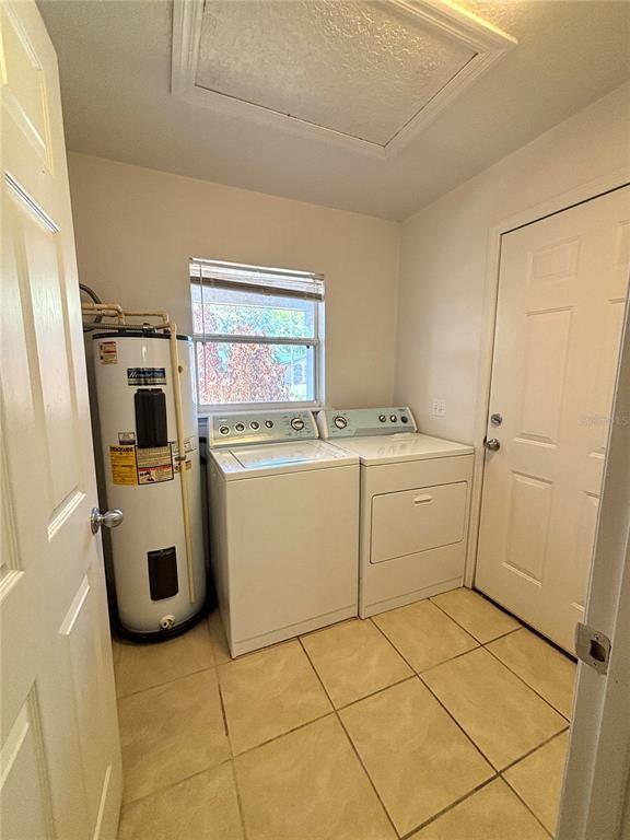 531 Carlisle Avenue Altamonte Springs, FL 32714 - Photo 12 of 18 a utility room with dryer and washer