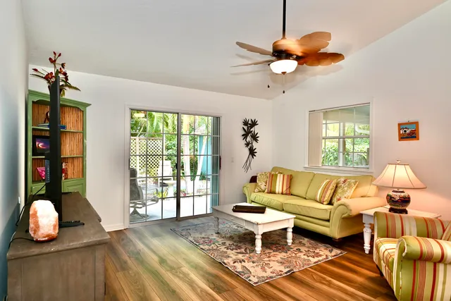 a living room with furniture and window