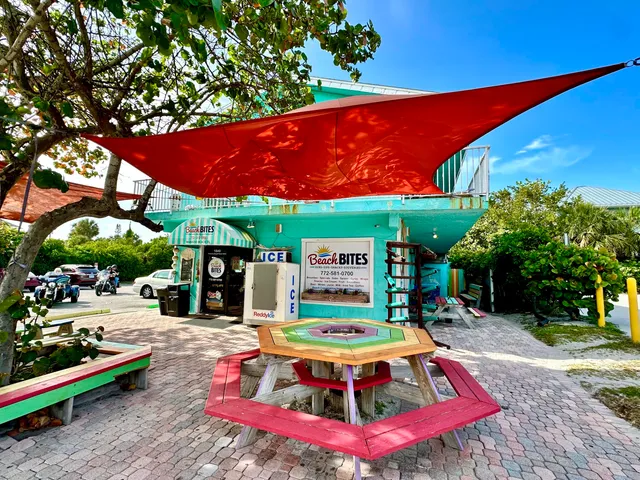 a view of a lake with houses in the back