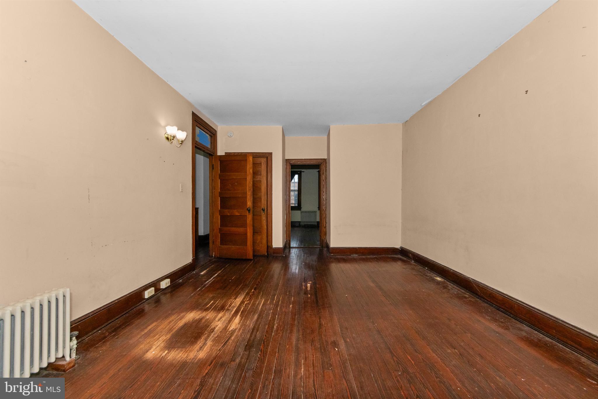 1014 Independence Avenue Southeast Washington, DC 20003 - Photo 19 of 51 a view of an empty room with wooden floor