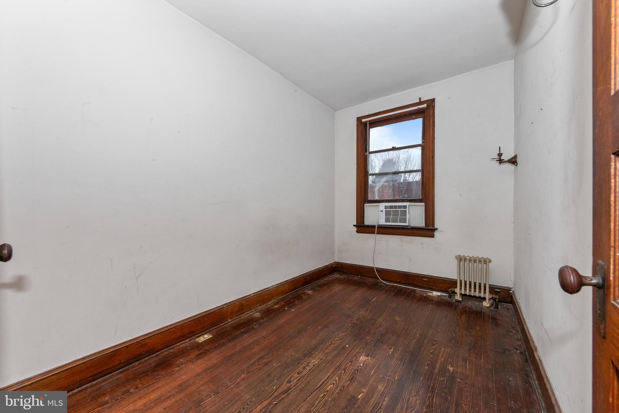 1014 Independence Avenue Southeast Washington, DC 20003 - Photo 26 of 51 a view of a room with wooden floor and window