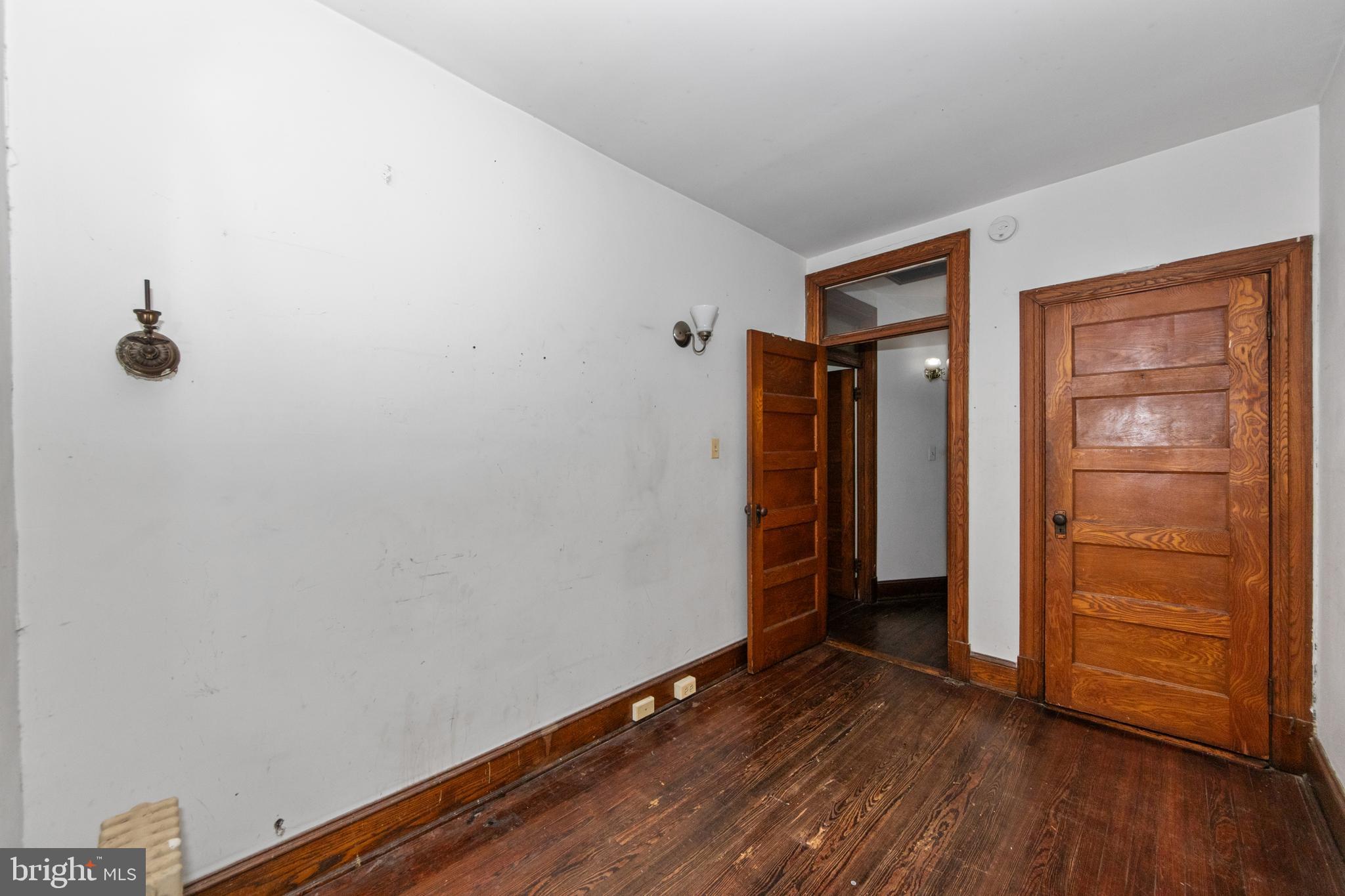 1014 Independence Avenue Southeast Washington, DC 20003 - Photo 28 of 51 a view of an empty room with closet and wooden floor