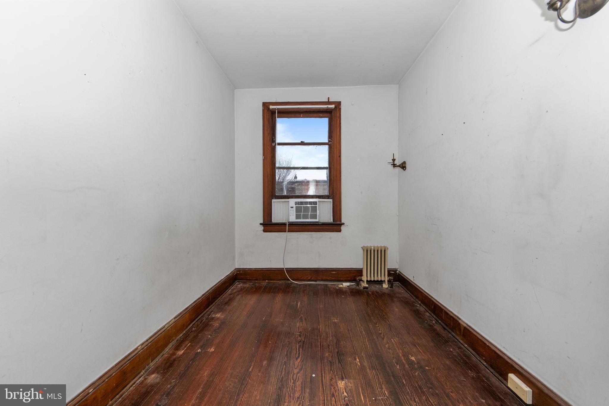 1014 Independence Avenue Southeast Washington, DC 20003 - Photo 29 of 51 a view of a room with wooden floor and window
