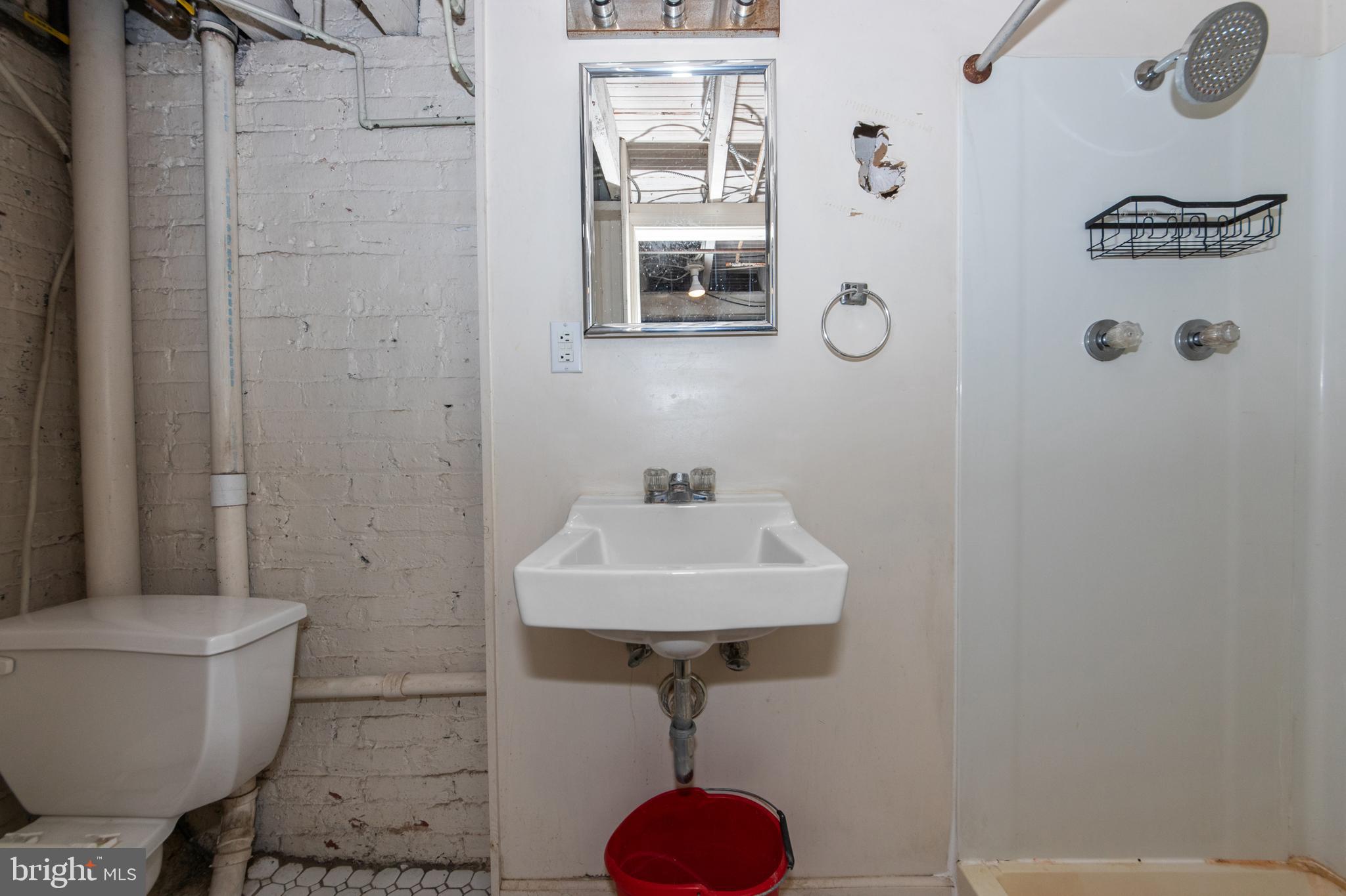 1014 Independence Avenue Southeast Washington, DC 20003 - Photo 38 of 51 a bathroom with a sink toilet and shower