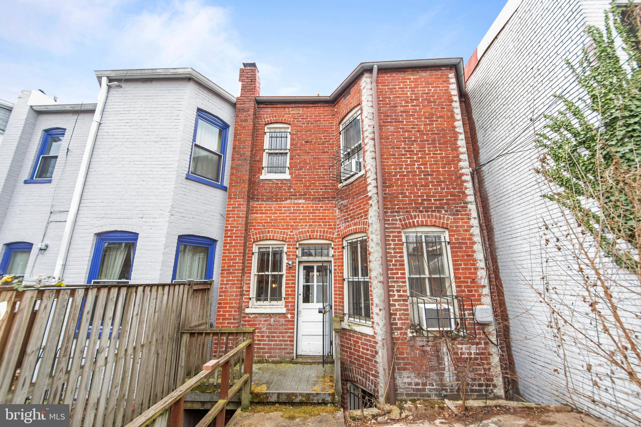 1014 Independence Avenue Southeast Washington, DC 20003 - Photo 46 of 51 a view of a brick building next to a yard