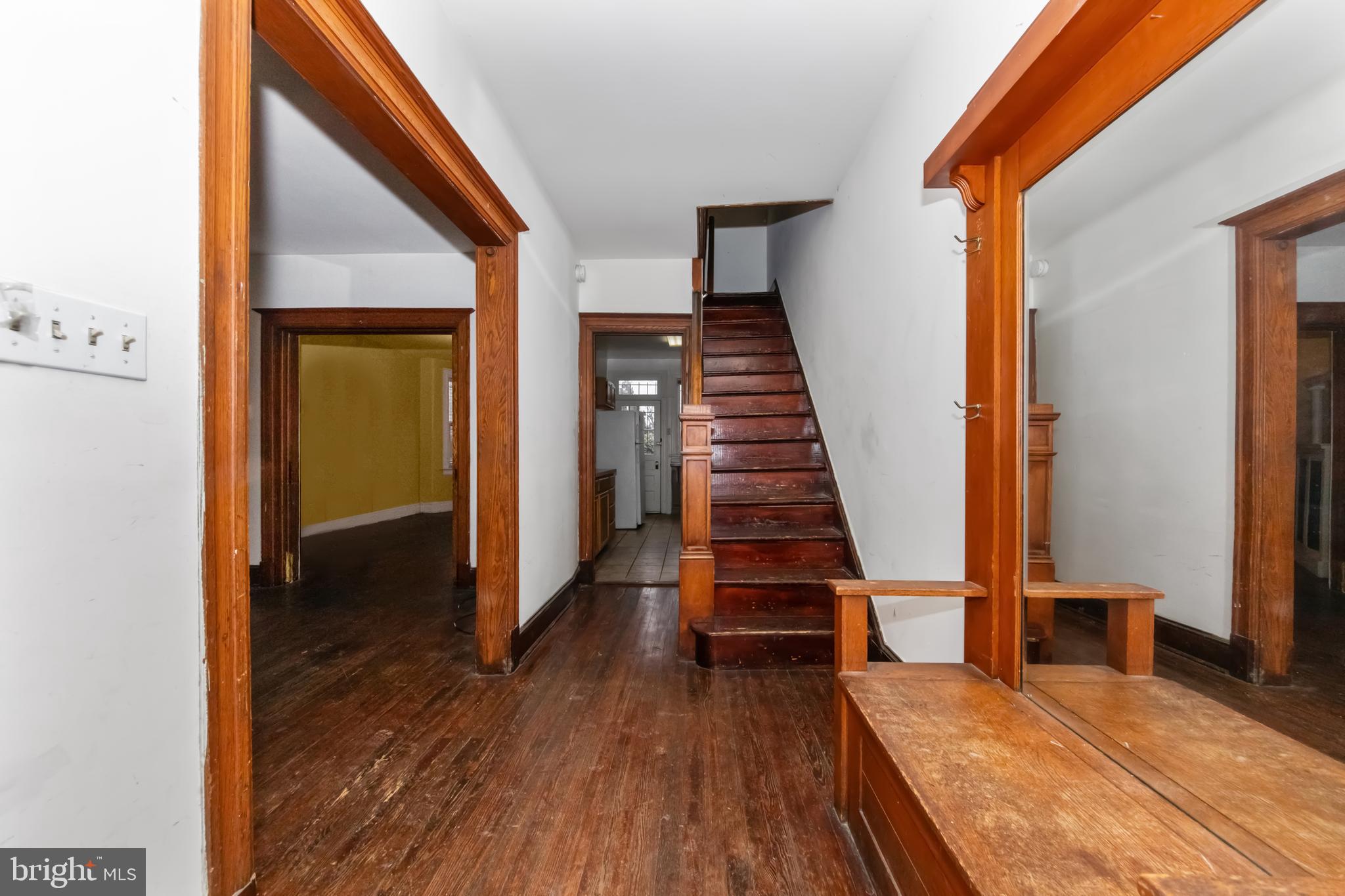 1014 Independence Avenue Southeast Washington, DC 20003 - Photo 5 of 51 a view of a hallway with wooden floor and staircase