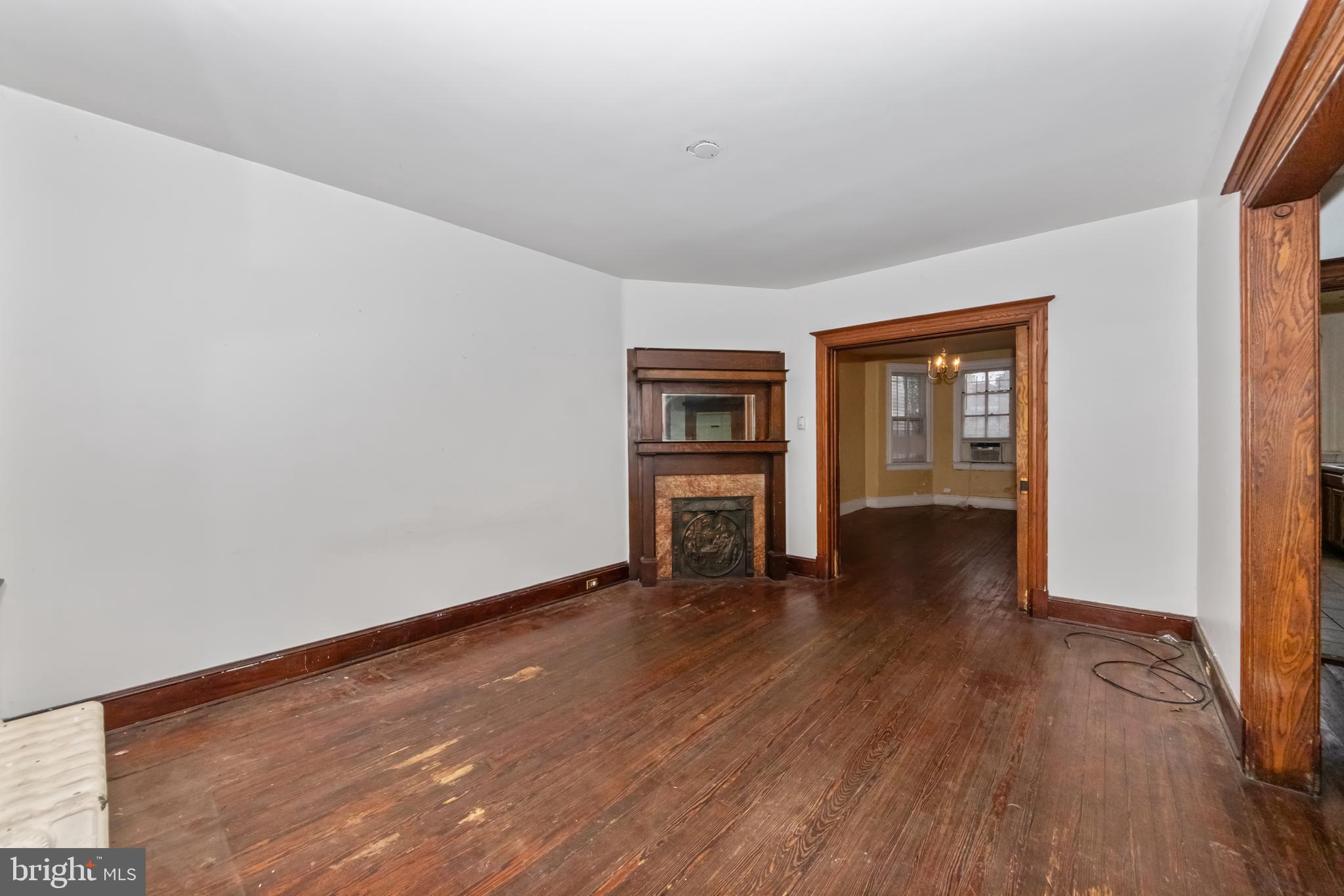 1014 Independence Avenue Southeast Washington, DC 20003 - Photo 7 of 51 wooden floor in an empty room