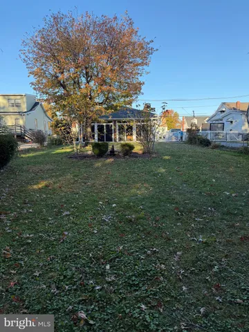a view of a house with a big yard
