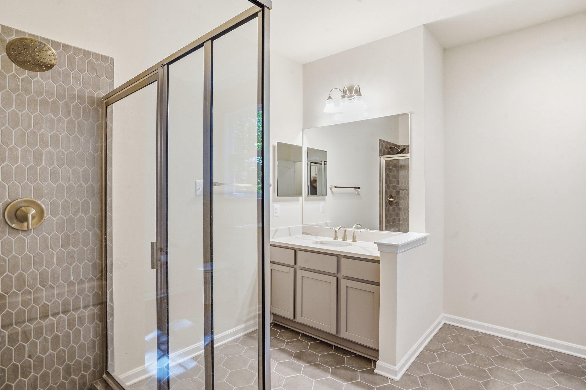 4755 South Polling House Road Harwood, MD 20776 - Photo 25 of 36 Modern primary bathroom with sleek design.